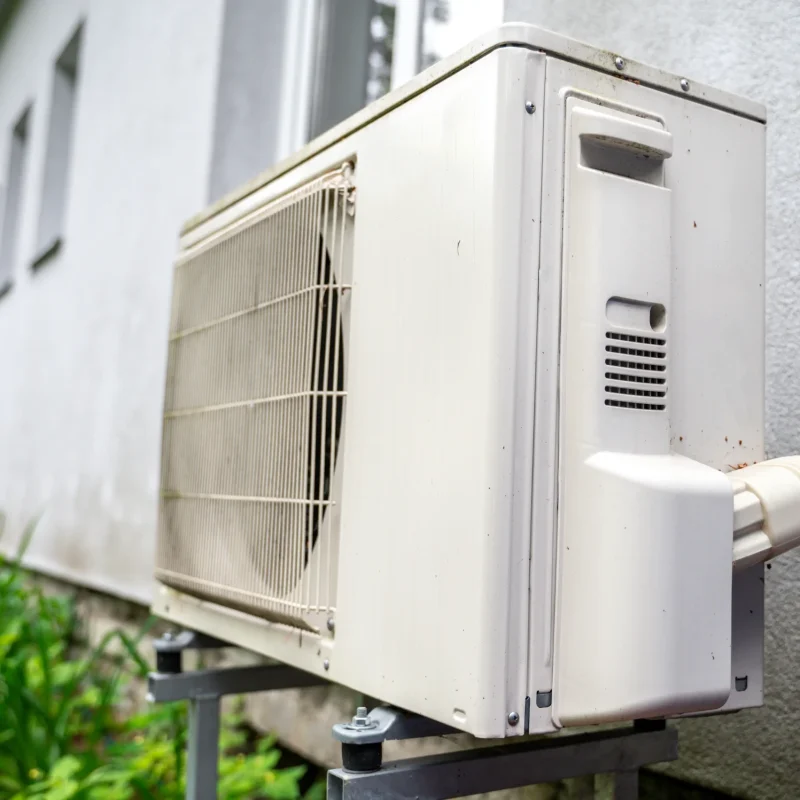 heat-pump-outside-of-residential-house-2023-11-27-05-12-03-utc